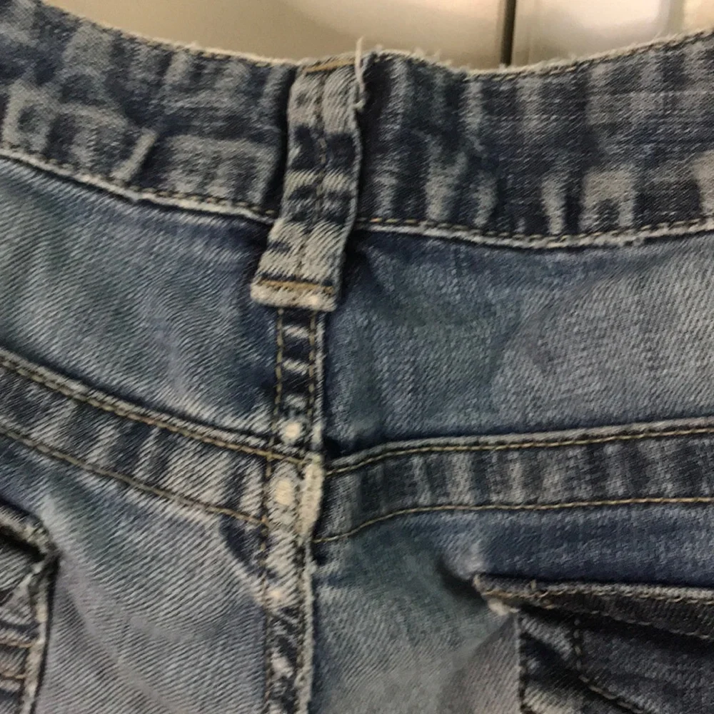 Calvin Klein distressed medium dark wash jeans 10